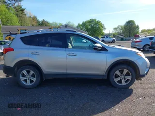 2013 Toyota RAV4 XLE with VIN JTMRFREV9DD013682, listed as a IAAI auction lot 42142414 with 202,680 mi miles. Bid and sale history available at carsss.com. Image 13.