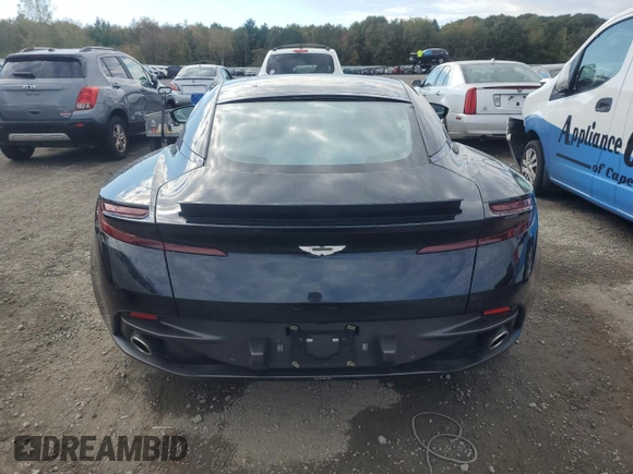 2017 Aston Martin DB11 z VIN SCFRMFAV5HGL02557, wystawiony jako Copart lot #74946544 z przebiegiem Nie podano mil oraz Szkody całkowita. Historia ofert i sprzedaży dostępna na DreamBid. Obrazek 6.