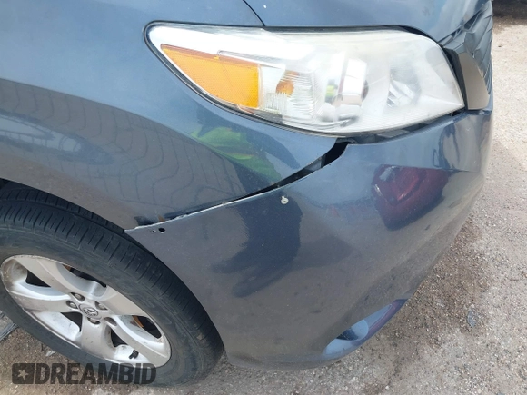 2013 Toyota Sienna L with VIN 5TDZK3DC9DS351449, listed as a IAAI auction lot 42397699 with Not provided miles and . Bid and sale history available at DreamBid. Image 6.