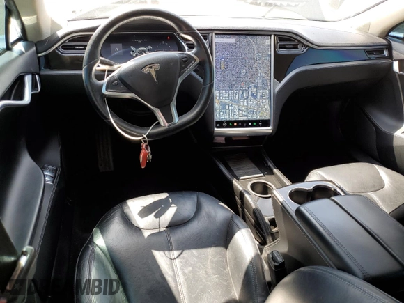 2014 Tesla Model S 60 z VIN 5YJSA1H17EFP36595, wystawiony jako Copart lot #53705035 z przebiegiem 148 254 mil mil oraz Szkoda całkowita • Salvage title. Historia ofert i sprzedaży dostępna na DreamBid. Obrazek 8.