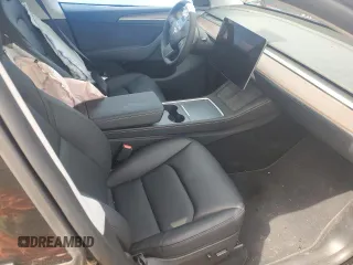 2024 Tesla Model Y Long Range with VIN 7SAYGDEE4RF198027, listed as a Copart auction lot 64008945 with 7,826 mi miles and Salvage title. Bid and sale history available at DreamBid. Image 7.