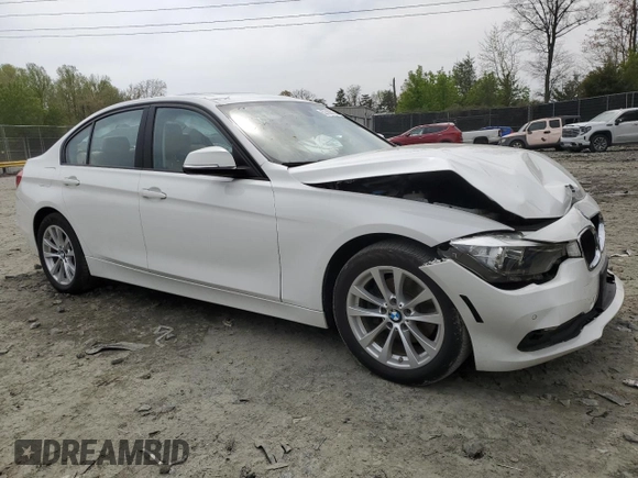 2017 BMW 3 Series 320i xDrive with VIN WBA8E5G5XHNU22436, listed as a Copart auction lot 52702805 with 74,008 mi miles and Salvage title. Bid and sale history available at DreamBid. Image 4.