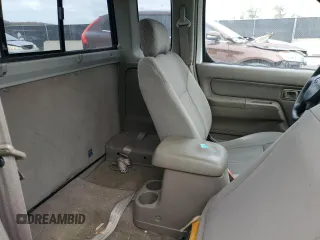 2001 Nissan Frontier XE with VIN 1N6DD26S91C398560, listed as a Copart auction lot 87893925 with 184,831 mi miles and Salvage title. Bid and sale history available at DreamBid. Image 11.