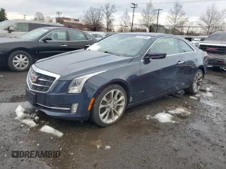 2015 Cadillac ATS Luxury AWD z VIN 1G6AH1RX3F0111947, wystawiony jako Copart lot #83416054 z przebiegiem 128 917 mil mil oraz Szkoda całkowita • Salvage title. Historia ofert i sprzedaży dostępna na DreamBid. Obrazek 1.