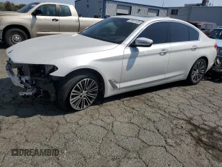 2018 BMW 5 Series 530i xDrive with VIN WBAJA7C51JWC76672, listed as a Copart auction lot 59872435 with 111,581 mi miles and Salvage title. Bid and sale history available at DreamBid. Image 1.