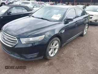 2014 Ford Taurus SEL with VIN 1FAHP2E83EG125068, listed as a IAAI auction lot 42101295 with 244,063 mi miles. Bid and sale history available at carsss.com. Image 2.