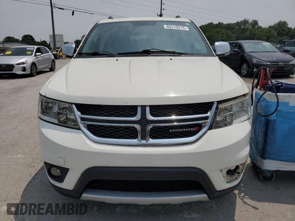 2013 Dodge Journey SXT with VIN 3C4PDCBG2DT547214, listed as a Copart auction lot 60210215 with 151,294 mi miles and Salvage title. Bid and sale history available at DreamBid. Image 5.