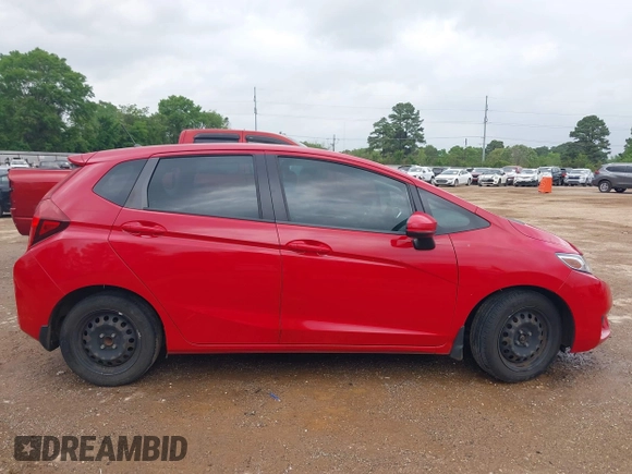 2017 Honda Fit LX z VIN 3HGGK5H58HM705063, wystawiony jako IAAI lot #41962906 z przebiegiem 163 835 mil mil oraz . Historia ofert i sprzedaży dostępna na DreamBid. Obrazek 13.