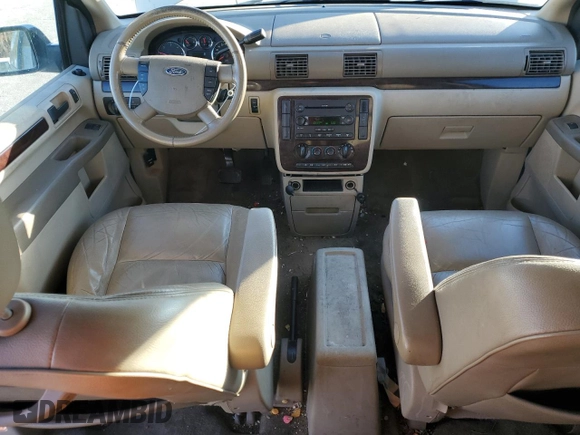 2007 Ford Freestar SEL z VIN 2FMDA52217BA11300, wystawiony jako Copart lot #48144555 z przebiegiem 184 225 mil mil oraz Szkody całkowita. Historia ofert i sprzedaży dostępna na DreamBid. Obrazek 8.