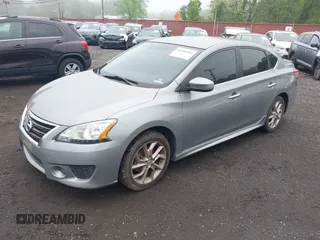 2013 Nissan Sentra SR z VIN 3N1AB7AP0DL766485, wystawiony jako IAAI lot #42188309 z przebiegiem 140 337 mil mil oraz . Historia ofert i sprzedaży dostępna na DreamBid. Obrazek 2.