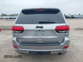 2019 Jeep Grand Cherokee Laredo E with VIN 1C4RJFAG9KC670974, listed as a IAAI auction lot 42333028 with 163,958 mi miles and . Bid and sale history available at DreamBid. Image 17.