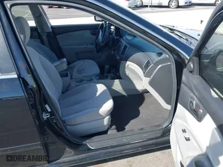 2009 Kia Optima LX with VIN KNAGE228895356658, listed as a IAAI auction lot 41580009 with 216,534 mi miles. Bid and sale history available at carsss.com. Image 5.