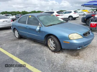 2005 Mercury Sable LS with VIN 1MEFM55S25A612965, listed as a IAAI auction lot 41988329 with Not Provided miles and . Bid and sale history available at carsss.com. Image 1.