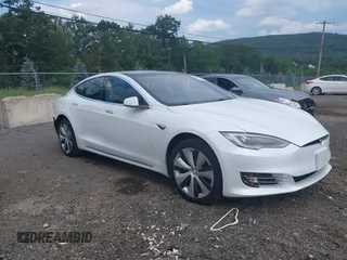 2020 Tesla Model S Long Range with VIN 5YJSA1E27LF399937, listed as a IAAI auction lot 42626656 with 57,305 mi miles and . Bid and sale history available at DreamBid. Image 1.