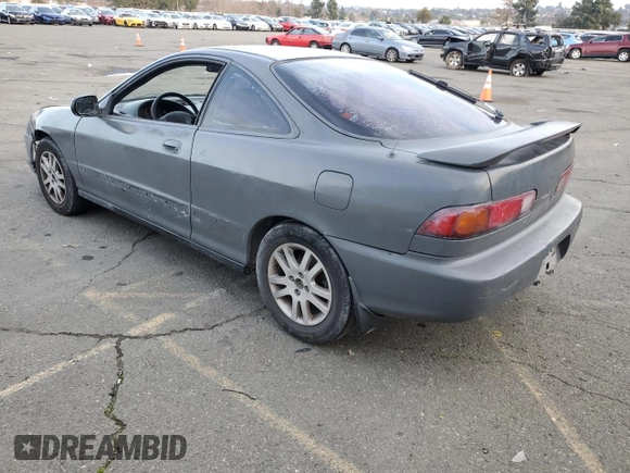 1997 Acura Integra GS with VIN JH4DC4465VS013917, listed as a Copart auction lot 87654165 with 218,585 mi miles and Salvage Title. Bid and sale history available at carsss.com. Image 2.