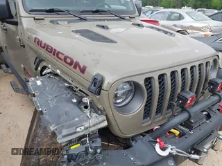 2020 Jeep Gladiator Rubicon z VIN 1C6JJTBG6LL179541, wystawiony jako IAAI lot #42050510 z przebiegiem 52 784 mil mil oraz . Historia ofert i sprzedaży dostępna na DreamBid. Obrazek 6.