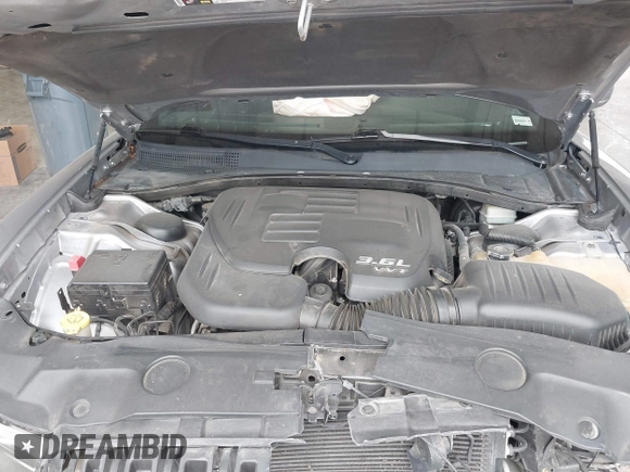 2013 Dodge Charger SE with VIN 2C3CDXBG7DH601545, listed as a IAAI auction lot 40332328 with 162,992 mi miles. Bid and sale history available at carsss.com. Image 10.