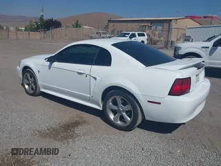 2000 Ford Mustang with VIN 1FAFP4049YF308623, listed as a IAAI auction lot 42708683 with 135,121 mi miles and . Bid and sale history available at DreamBid. Image 3.