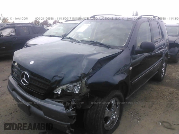 1999 Mercedes-Benz M 320/430/500 with VIN 4JGAB54E5XA124430, listed as a IAAI auction lot 41707727 with 176,293 mi miles and . Bid and sale history available at DreamBid. Image 2.