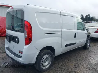 2022 Ram ProMaster City Passenger with VIN ZFBHRFAB7N6W36174, listed as a IAAI auction lot 41472606 with 84,269 mi miles. Bid and sale history available at carsss.com. Image 4.