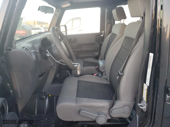 2009 Jeep Wrangler Unlimited X with VIN 1J4GA39129L729177, listed as a Copart auction lot 77780104 with 85,282 mi miles and Salvage Title. Bid and sale history available at carsss.com. Image 7.