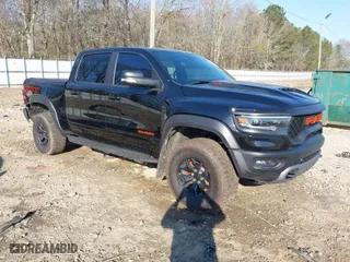 2021 Ram 1500 TRX with VIN 1C6SRFU99MN758770, listed as a IAAI auction lot 38873371 with 59,097 mi miles. Bid and sale history available at carsss.com. Image 1.