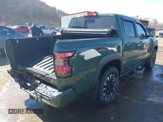 2023 Nissan Frontier Pro-4X z VIN 1N6ED1EK2PN615718, wystawiony jako IAAI lot #41739218 z przebiegiem 19 875 mil mil oraz . Historia ofert i sprzedaży dostępna na DreamBid. Obrazek 4.