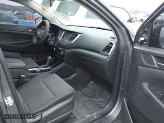 2017 Hyundai Tucson Value with VIN KM8J33A22HU358357, listed as a IAAI auction lot 41583774 with 139,338 mi miles. Bid and sale history available at carsss.com. Image 5.