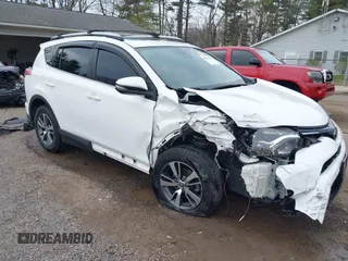 2018 Toyota RAV4 XLE with VIN JTMRFREV9JJ218173, listed as a IAAI auction lot 42037959 with 91,056 mi miles. Bid and sale history available at carsss.com. Image 1.