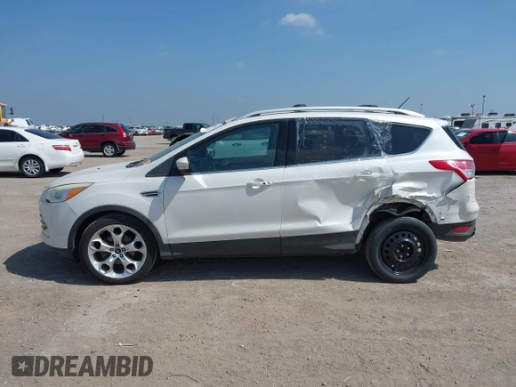 2015 Ford Escape Titanium with VIN 1FMCU0JX4FUB07322, listed as a IAAI auction lot 42220345 with 184,852 mi miles and . Bid and sale history available at DreamBid. Image 14.