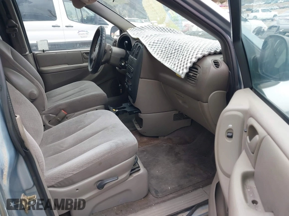 2003 Dodge Grand Caravan with VIN 1D4GP44383B252581, listed as a IAAI auction lot 41838754 with 164,773 mi miles and . Bid and sale history available at DreamBid. Image 5.