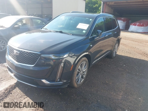 2020 Cadillac XT6 FWD Premium Luxury with VIN 1GYKPCRS0LZ206567, listed as a IAAI auction lot 42254511 with 80,443 mi miles and . Bid and sale history available at DreamBid. Image 18.