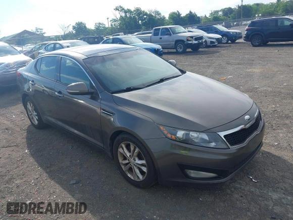2013 Kia Optima EX with VIN 5XXGN4A78DG176690, listed as a IAAI auction lot 42196301 with 300,717 mi miles and . Bid and sale history available at DreamBid. Image 1.