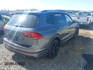 2024 Volkswagen Tiguan SE R-Line Black with VIN 3VVCB7AX2RM114556, listed as a IAAI auction lot 41887373 with 7,013 mi miles and . Bid and sale history available at DreamBid. Image 4.