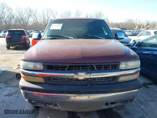 1999 Chevrolet Silverado 1500 LS with VIN 1GCEK19T1XE122222, listed as a IAAI auction lot 41753362 with 130,618 mi miles. Bid and sale history available at carsss.com. Image 6.