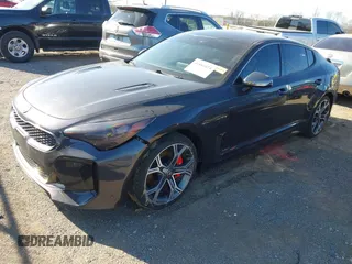 2021 Kia Stinger GT with VIN KNAE35LC4M6097199, listed as a IAAI auction lot 41884424 with 61,490 mi miles. Bid and sale history available at carsss.com. Image 16.