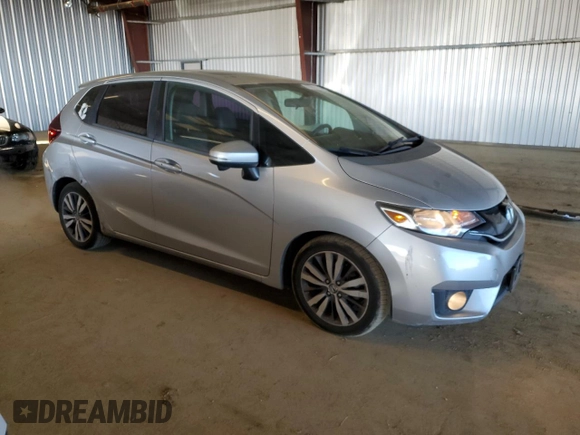 2015 Honda Fit EX-L with VIN 3HGGK5H83FM707228, listed as a Copart auction lot 50006055 with 97,573 mi miles and Salvage title. Bid and sale history available at DreamBid. Image 4.