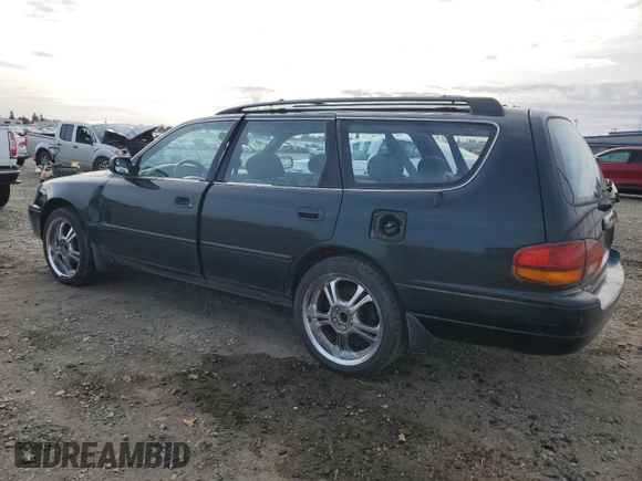 1995 Toyota Camry LE z VIN 4T1GK12W4SU079938, wystawiony jako Copart lot #77065084 z przebiegiem 222 731 mil mil oraz Szkoda całkowita • Salvage title. Historia ofert i sprzedaży dostępna na DreamBid. Obrazek 2.