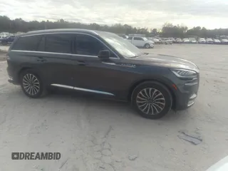 2020 Lincoln Aviator Reserve z VIN 5LM5J7WC6LGL04967, wystawiony jako IAAI lot #41256163 z przebiegiem 68 637 mil mil oraz . Historia ofert i sprzedaży dostępna na DreamBid. Obrazek 1.