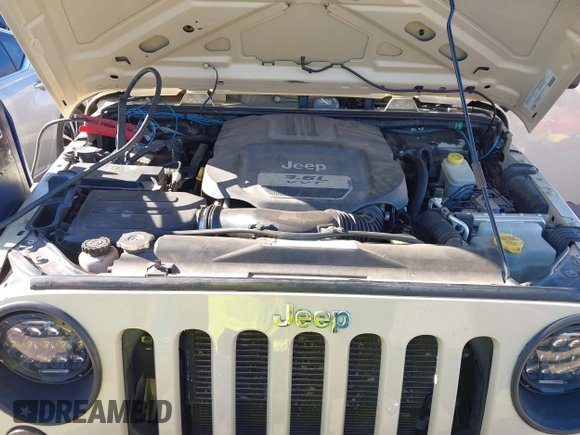 2012 Jeep Wrangler Unlimited Sport z VIN 1C4BJWDG8CL102486, wystawiony jako IAAI lot #41386649 z przebiegiem 156 993 mil mil oraz . Historia ofert i sprzedaży dostępna na DreamBid. Obrazek 10.
