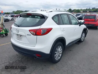 2016 Mazda CX-5 Sport with VIN JM3KE4BY7G0764563, listed as a IAAI auction lot 42279993 with 128,950 mi miles and . Bid and sale history available at DreamBid. Image 4.