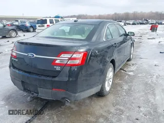 2013 Ford Taurus SEL with VIN 1FAHP2H80DG234999, listed as a IAAI auction lot 41577003 with 115,403 mi miles and . Bid and sale history available at DreamBid. Image 4.