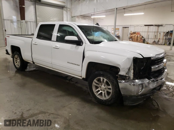 2017 Chevrolet Silverado 1500 LT with VIN 1GCUKREC4HF189876, listed as a Copart auction lot 79705594 with 185,685 mi miles and Salvage Title. Bid and sale history available at DreamBid. Image 4.