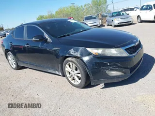 2013 Kia Optima LX with VIN 5XXGM4A72DG141842, listed as a IAAI auction lot 41758919 with 153,114 mi miles. Bid and sale history available at carsss.com. Image 1.