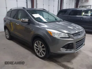 2014 Ford Escape SE with VIN 1FMCU9G9XEUD37491, listed as a IAAI auction lot 42000637 with 141,580 mi miles. Bid and sale history available at carsss.com. Image 1.