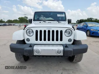 2014 Jeep Wrangler Unlimited Sahara with VIN 1C4BJWEG5EL309502, listed as a Copart auction lot 61804885 with 60,683 mi miles and Salvage title. Bid and sale history available at DreamBid. Image 5.
