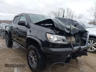 2018 Chevrolet Colorado 4WD ZR2 with VIN 1GCGTEEN9J1173647, listed as a IAAI auction lot 42016015 with 102,041 mi miles. Bid and sale history available at carsss.com. Image 1.
