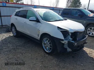 2013 Cadillac SRX Premium Collection z VIN 3GYFNEE39DS624965, wystawiony jako IAAI lot #41367248 z przebiegiem 96 744 mil mil oraz . Historia ofert i sprzedaży dostępna na DreamBid. Obrazek 1.