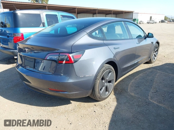 2023 Tesla Model 3 with VIN 5YJ3E1EA7PF447409, listed as a IAAI auction lot 41965416 with 40,033 mi miles and . Bid and sale history available at DreamBid. Image 4.