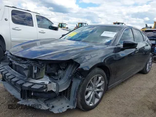 2023 Acura TLX with VIN 19UUB5F36PA002853, listed as a IAAI auction lot 42212733 with 34,432 mi miles and . Bid and sale history available at DreamBid. Image 2.